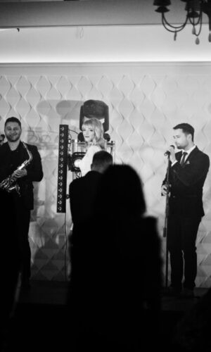 Musicial music live band performing on a stage with different li Musicial music live band performing on a stage with different li