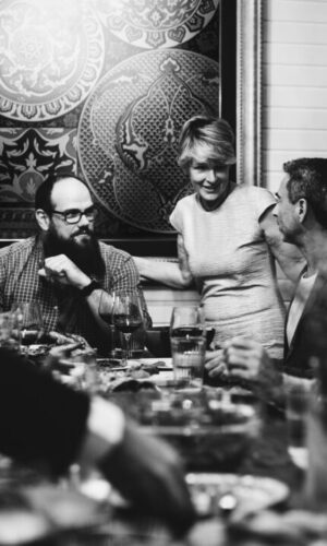 Group of diverse friends are having a dinner together Group of diverse friends are having a dinner together